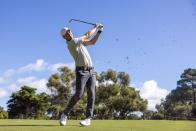 Captain Martin Kaymer of Cleeks GC hits his shot on the 18th hole during the practice round for LIV Golf Adelaide at the Grange Golf Club Thursday, April 25, 2024, in Adelaide, Australia. (Chris Trotman/LIV Golf via AP)