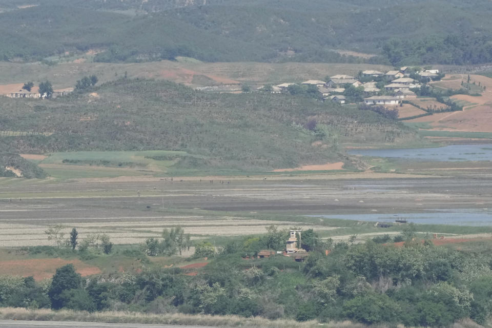 North Korea's Kaepoong town is seen from the unification observatory in Paju, South Korea, Friday, May 13, 2022. North Korea said Friday that six people died and 350,000 have been treated for a fever that has spread "explosively" across the nation, a day after its first acknowledgement of a COVID-19 outbreak. (AP Photo/Ahn Young-joon)