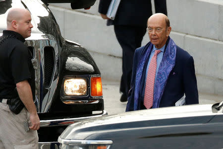 Incoming Trump administration Commerce Secretary nominee Wilbur Ross (R) departs after working a simulated crisis scenario during transition meetings at the Eisenhower Executive Office Building at the White House in Washington, U.S. January 13, 2017. REUTERS/Jonathan Ernst