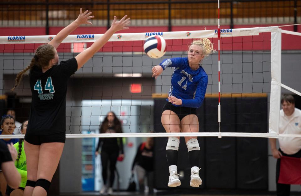 Kendra Pruitt of Barron Collier gets a kill down the line against Jensen Beach in the FHSAA Class 5A volleyball state championship on Saturday, Nov. 12, 2022, at Polk State College in Winter Haven.
