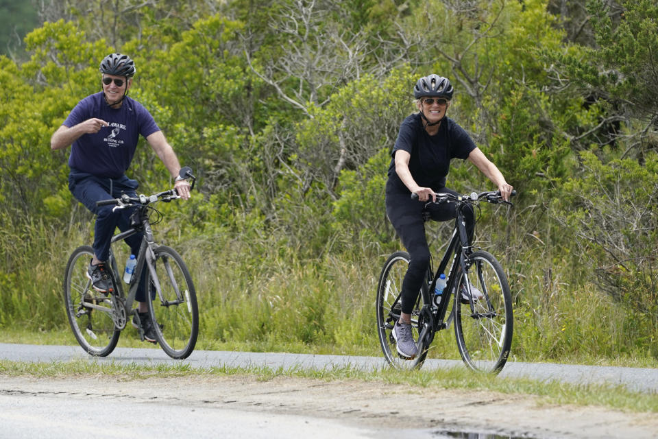President Joe Biden and first lady Jill Biden take a bike ride in Rehoboth Beach, Del., Thursday, June 3, 2021. The Biden's are spending a few days in Rehoboth Beach to celebrate first lady Jill Biden's 70th birthday. (AP Photo/Susan Walsh)