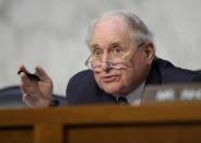 FILE - In this June 4, 2013, file photo, Senate Armed Services Committee Chairman Sen. Carl Levin, D-Mich. asks a question of a witness during a hearing on Capitol Hill in Washington on legislation regarding sexual assaults in the military. Former Sen. Carl Levin, a powerful voice for the military during his career as Michigan’s longest-serving U.S. senator, has died. The Democrat was 87. Levin’s family says Levin died Thursday, July 29, 2021. (AP Photo/Susan Walsh, File)