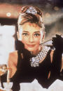<p> This fringed updo, worn by Audrey Hepburn as Holly Golightly in the iconic 1960s movie <em>Breakfast At Tiffany's</em>, is such a classic look from the beauty history books. Piled high like many '60s hairstyles, it's one that's probably been recreated at fancy dress parties around the world thousands of times. </p>
