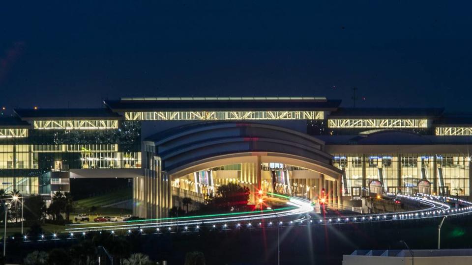 The first Brightline passenger train leaves a streak of light in this long exposure, upon its first departure from the Orlando International Airport Intermodal Terminal, headed to Miami, on Friday. The high-speed trains are manufactured by Siemens in Sacramento.