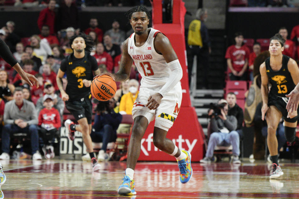 Maryland guard Hakim Hart brings the ball up during the second half of the team's NCAA college basketball game against UMBC on Thursday, Dec. 29, 2022, in College Park, Md. Maryland won 80-64. (AP Photo/Jess Rapfogel)