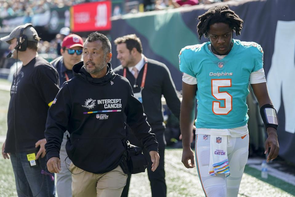 Miami Dolphins quarterback Teddy Bridgewater (5) leaves the field after taking a hit from the New York Jets during the first quarter of an NFL football game, Sunday, Oct. 9, 2022, in East Rutherford, N.J. (AP Photo/Seth Wenig)