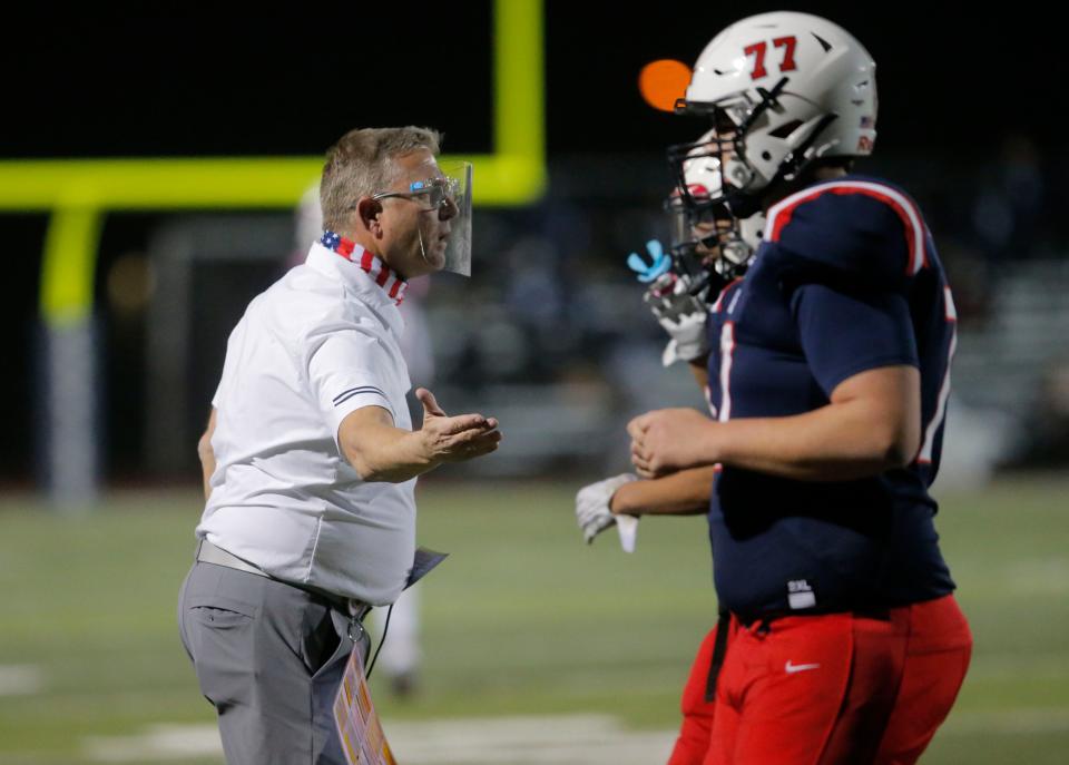 American Leadership Academy head coach Rich Edwards tells the referee that a player ran into his kicker during the 4A semifinal football game against Mesquite High School at American Leadership Academy in Queen Creek on Dec. 4, 2020.