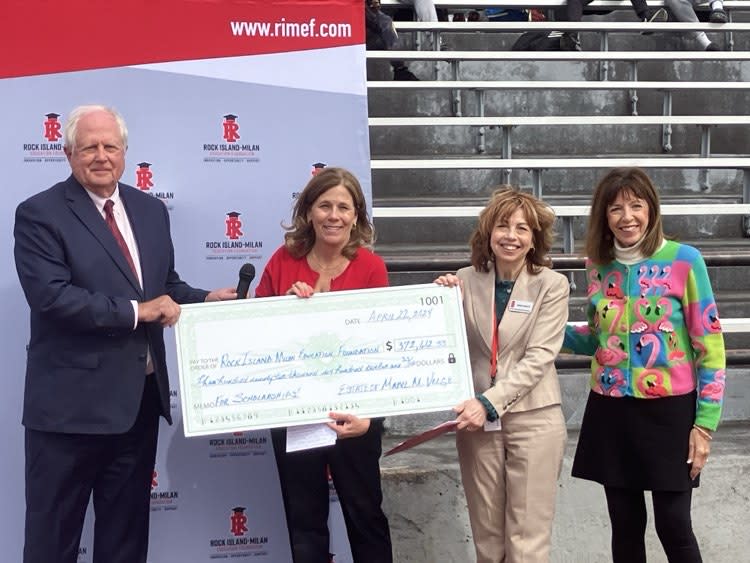 Receiving the $372,000 bequest from the estate of Mabel Velge on Monday are (from left) Rock Island attorney William Stengel, Rock Island-Milan Education Foundation board president Barbara Cady, RIMEF executive director Monta Ponsetto, and Mary Gloeckner, longtime friend of Velge and executor of her estate (photos by Jonathan Turner).