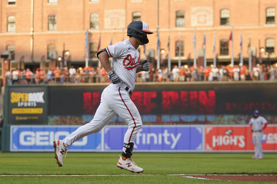 Baltimore Orioles' Adam Frazier runs the bases after hitting a two-run home run off Toronto Blue Jays starting pitcher Chris Bassitt during the second inning of a baseball game, Tuesday, June 13, 2023, in Baltimore. (AP Photo/Julio Cortez)