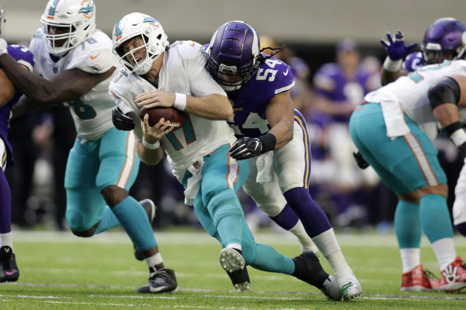 Miami Dolphins quarterback Ryan Tannehill (17) is sacked by Minnesota Vikings middle linebacker Eric Kendricks (54) during the second half of an NFL football game, Sunday, Dec. 16, 2018, in Minneapolis. (AP Photo/Andy Clayton-King)