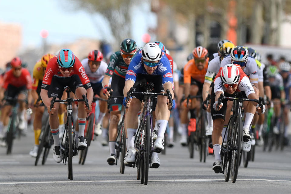 MOLINS DE REI SPAIN  MARCH 25 EDITORS NOTE Alternate crop LR Maxim Van Gils of Belgium and Team Lotto Dstny Kaden Groves of Australia and Team AlpecinDeceuninck and Bryan Coquard of France and Team Cofidis sprint at finish line during the 102nd Volta Ciclista a Catalunya 2023 Stage 6 a 1741km stage from Martorell to Molins de Rei  UCIWT  on March 25 2023 in Molins de Rey Spain Photo by David RamosGetty Images