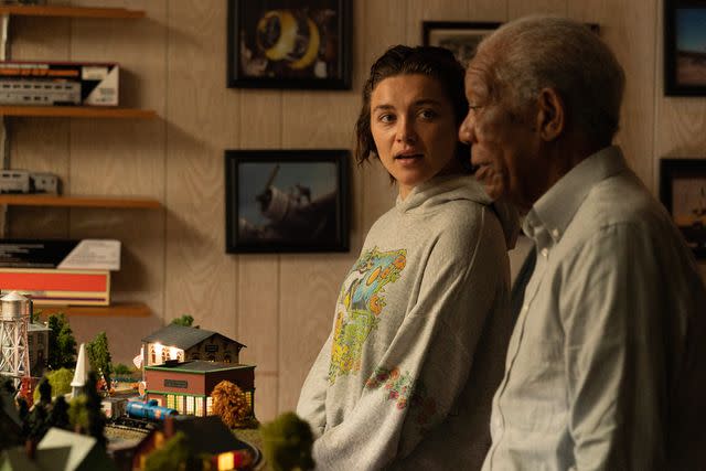 <p>Jeong Park/Metro Goldwyn Mayer Pictures</p> Florence Pugh and Morgan Freeman in <i>A Good Person</i>, 2023