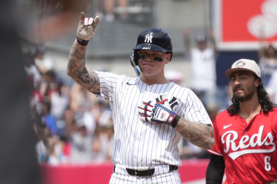 New York Yankees' Alex Verdugo celebrates hitting a double during the fourth inning of a baseball game against the Cincinnati Reds, Thursday, July 4, 2024, in New York. (AP Photo/Pamela Smith)