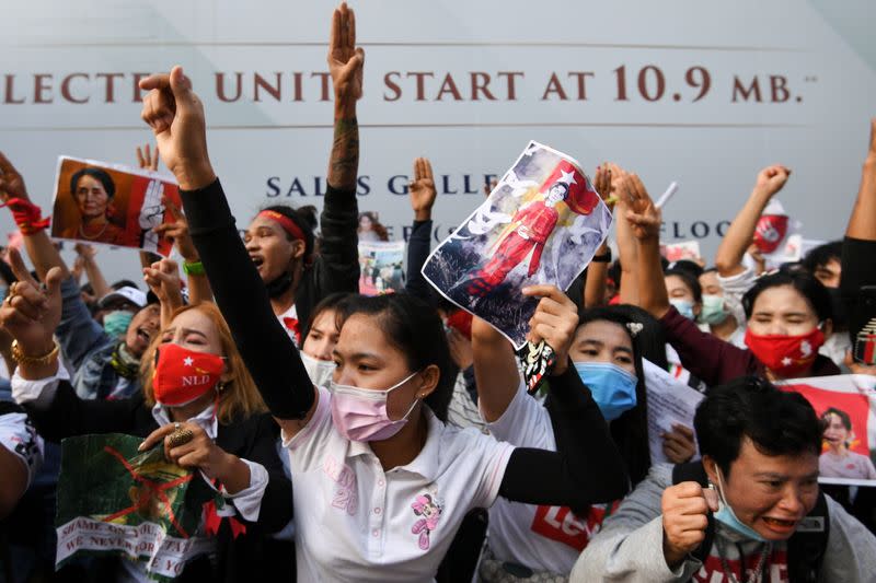 Myanmar citizens protest against the military coup outside the Myanmar embassy, in Bangkok