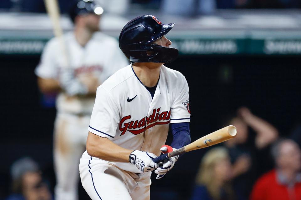 Cleveland Guardians' Will Brennan watches his game-winning double off Houston Astros relief pitcher Seth Martinez in the 14th inning Friday in Cleveland.