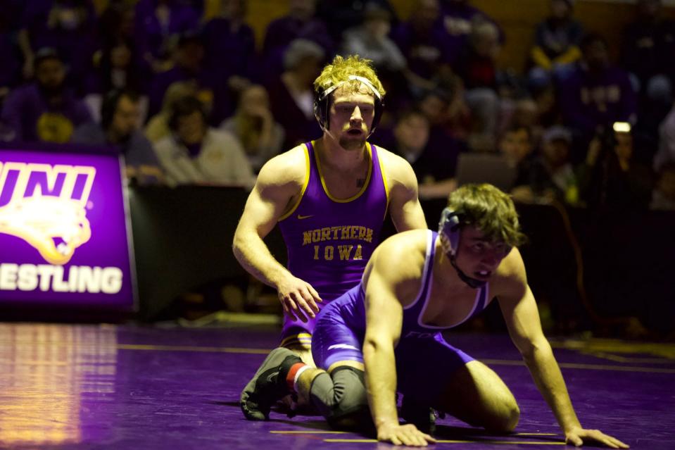 Northern Iowa's Cael Happel surveys his opponent during the 141-pound match on Friday night at the West Gym in Cedar Falls. Happel scored five takedowns and beat Air Force's Cody Phippen by a 13-4 major decision.