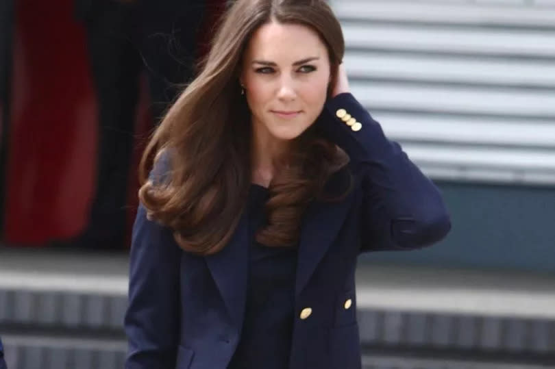 Catherine, Duchess of Cambridge arrives to board a plane of the Royal Canadian Air Force at London's Heathrow Airport on June 30, 2011 in London, England.