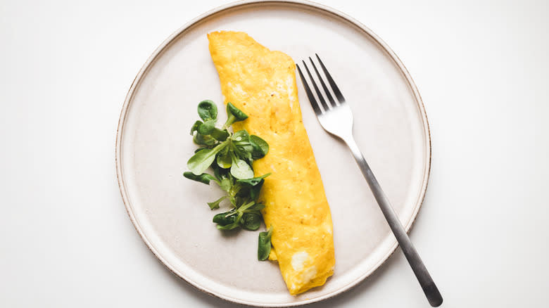 French omelet and greens