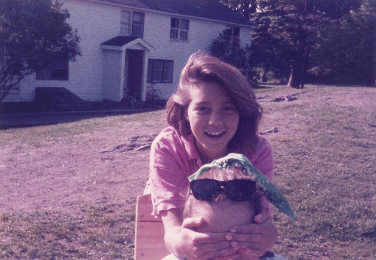 Allison Lirish Dean (top, smiling) as a young student, with a friend on the campus of the Putney School, spring 1985. (Photo: Courtesy of Allison Lirish Dean)