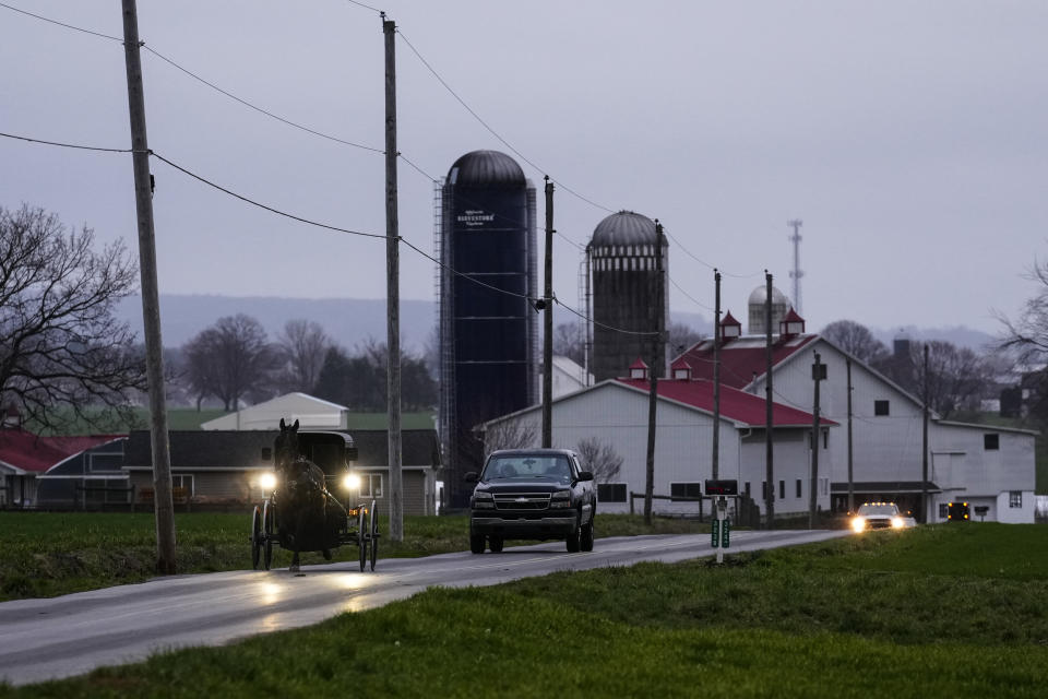 People arrive for the 56th annual mud sale to benefit the local fire department in Gordonville, Pa., Saturday, March 9, 2024. Mud sales are a relatively new tradition in the heart of Pennsylvania's Amish country, going back about 60 years and held in early spring as the ground begins to thaw but it's too early for much farm work. (AP Photo/Matt Rourke)