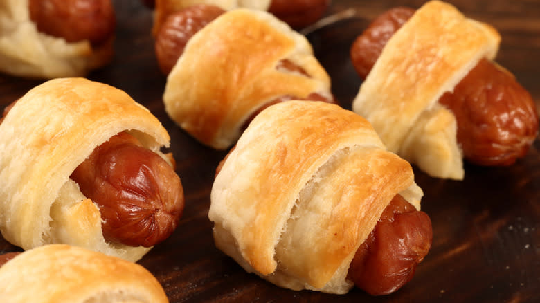 Cocktail weiner pigs in a blanket wrapped in dough