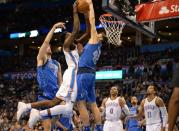 Nov 12, 2017; Oklahoma City, OK, USA; Dallas Mavericks forward Maximilian Kleber (42) blocks a shot attempt by Oklahoma City Thunder forward Jerami Grant (9) during the fourth quarter at Chesapeake Energy Arena. Mark D. Smith-USA TODAY Sports