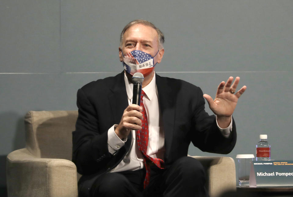 Former U.S. Secretary of State Mike Pompeo answers after he delivering a speech during his four-day trip to Taiwan in Taipei, Taiwan, Friday, March 4, 2022. (AP Photo/Chiang Ying-ying)