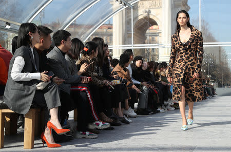 A model presents a creation by Bottega Veneta during the Milan Fashion Week in Milan, Italy February 22, 2019. REUTERS/Alessandro Garofalo