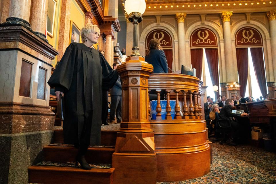 Iowa Chief Justice Susan Christensen leaves the podium after her Condition of the Judiciary address Wednesday at the Iowa Capitol.