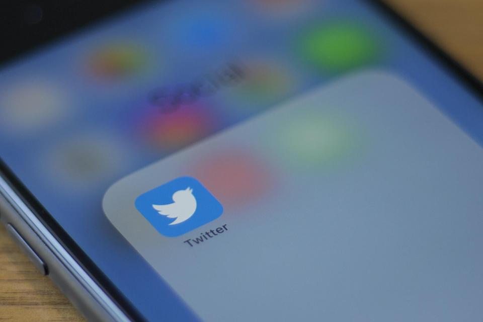 The Twitter logo is seen on a phone in this photo illustration in Washington, DC, on July 10, 2019: ALASTAIR PIKE/AFP via Getty Images