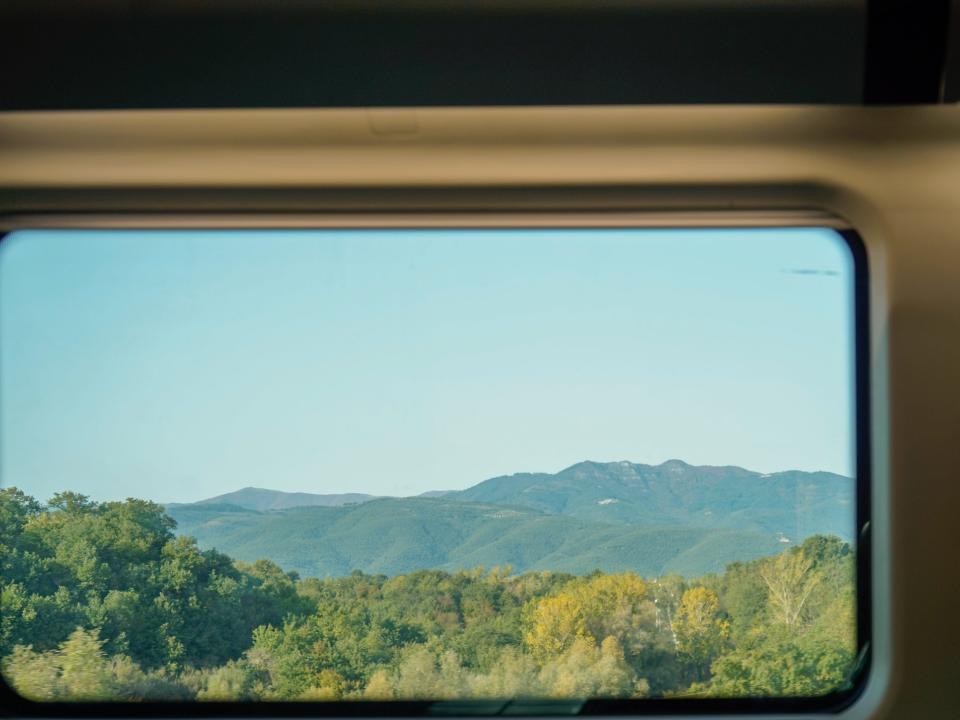 A view out the window of a train traveling from Venice to Rome in Italy.