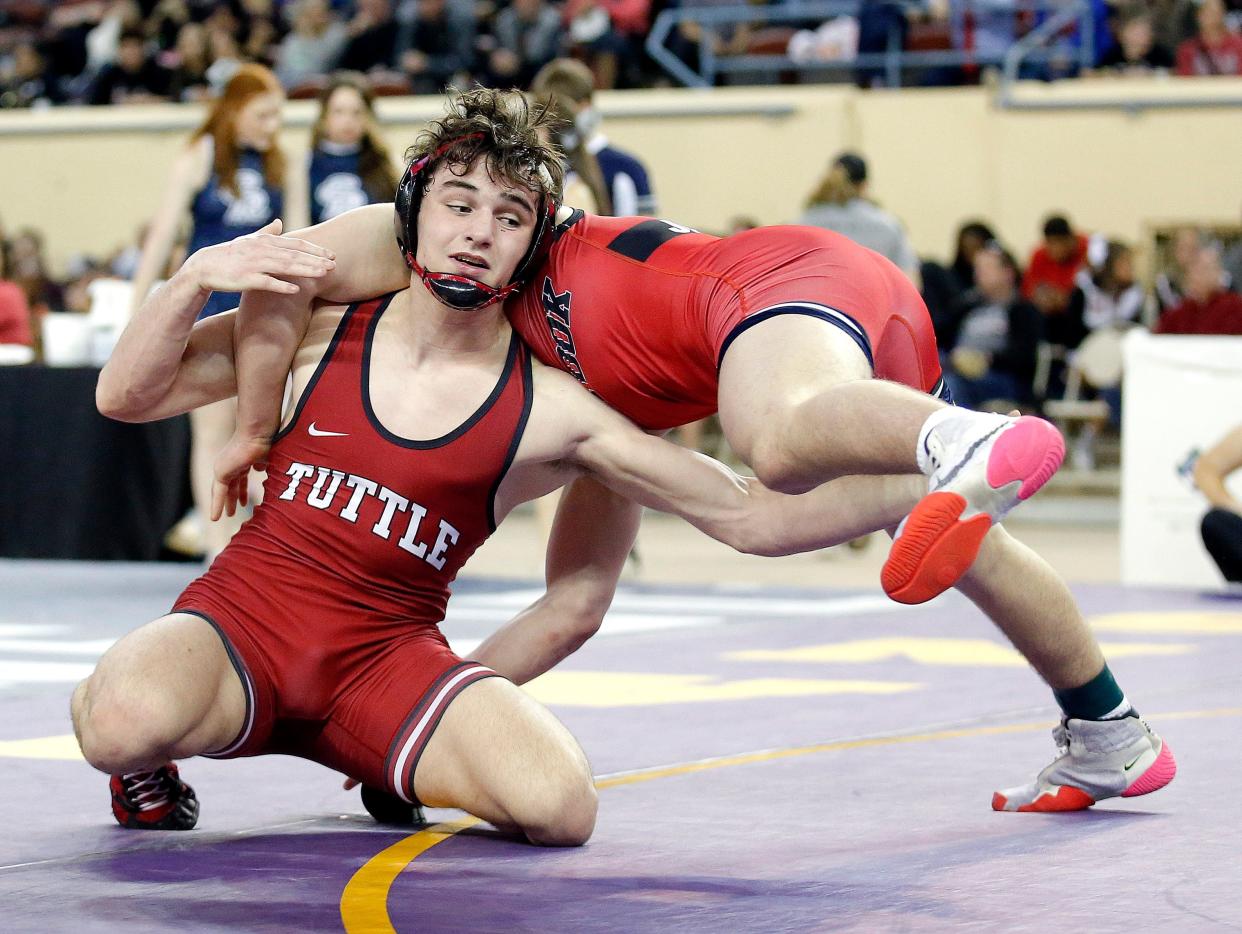 Tuttle's Ethan Teague wrestles Skiatook's Josey Jernegan in the class 4A 157-pound match during the Oklahoma state wrestling championships at State Fair Arena in Oklahoma City, Saturday, Feb.25, 2023. 