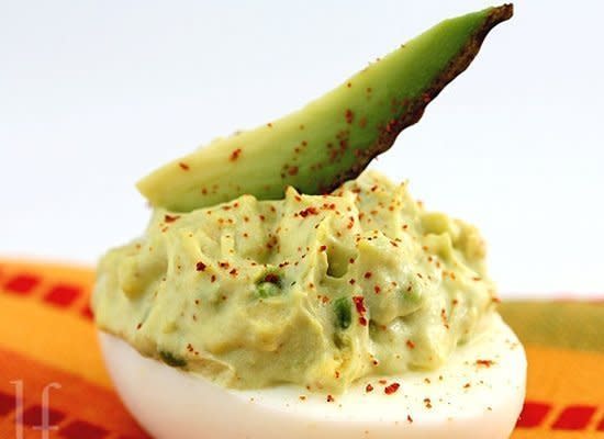 <strong>Get the <a href="http://eatingwelllivingthin.wordpress.com/2009/10/01/get-em-while-the-gettins-good/" target="_hplink">Avocado Deviled Eggs recipe from Eating Well Living Thin</a></strong>