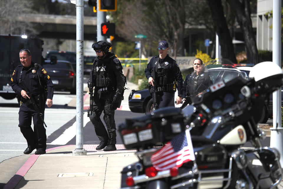 <p>Police walk outside of the YouTube headquarters on April 3, 2018 in San Bruno, Calif. (Photo: Justin Sullivan/Getty Images) </p>