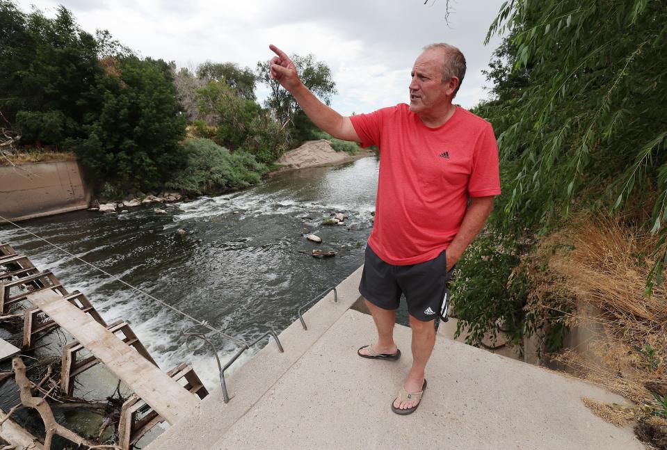 Brad Blanch looks over a dam on the Weber River in Weber County on Wednesday, July 26, 2023. Blanch is a West Weber resident who wants to lease several hundred acre-feet of water to benefit the Great Salt Lake. | Jeffrey D. Allred, Deseret News