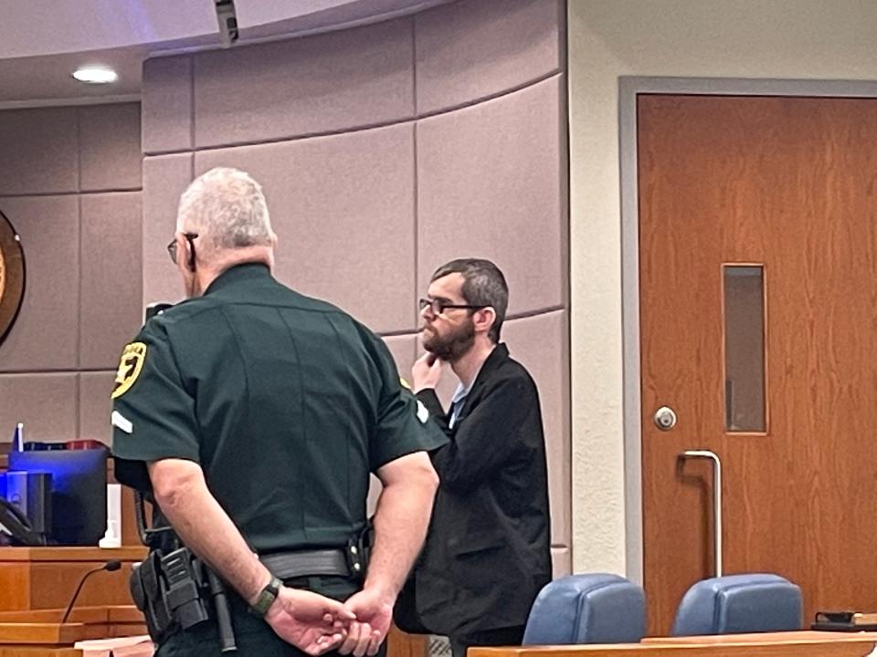 A picture of Sean Patrick Fenstemaker wearing a black jacket at his trial.