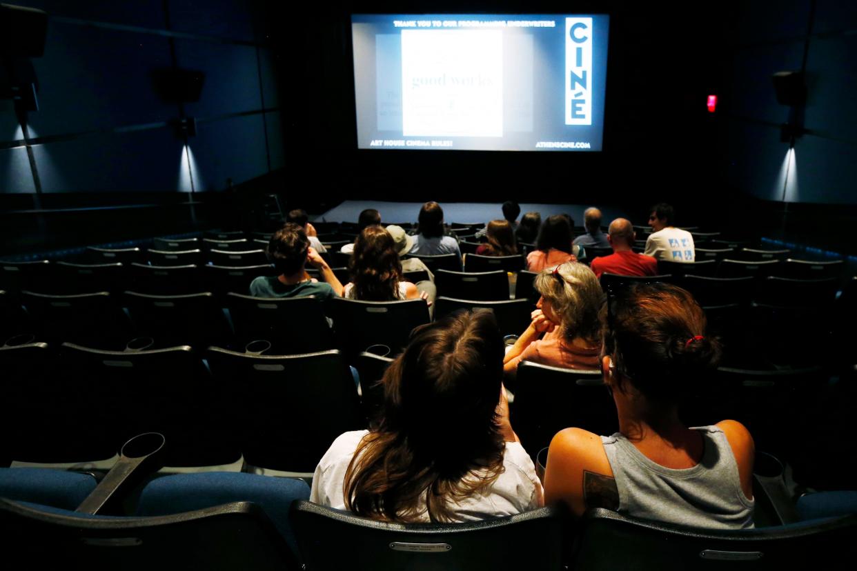 Patrons watch a movie at Ciné on Thursday, May 27, 2021. Ciné is one of four downtown venues that will host the first annual Athens Film Festival. scheduled to take place Aug. 15-17, 2024.