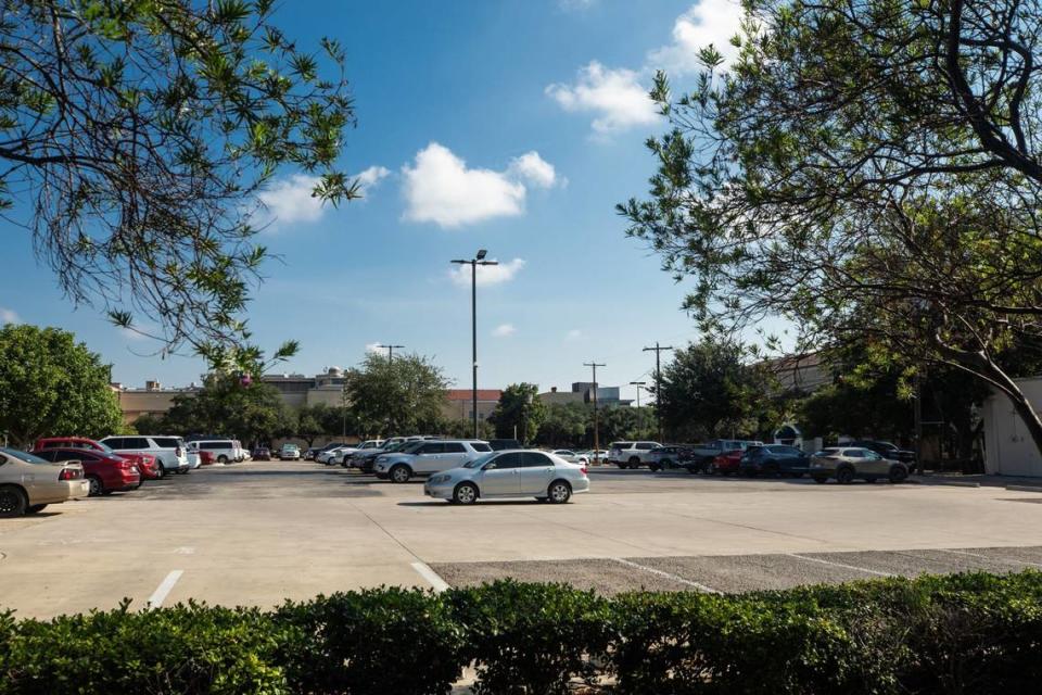 A parking lot by the Texas Christian University campus store on Friday, July 19, 2024, in Fort Worth. TCU filed plans with the city for a new mixed use development off of West Berry Street.