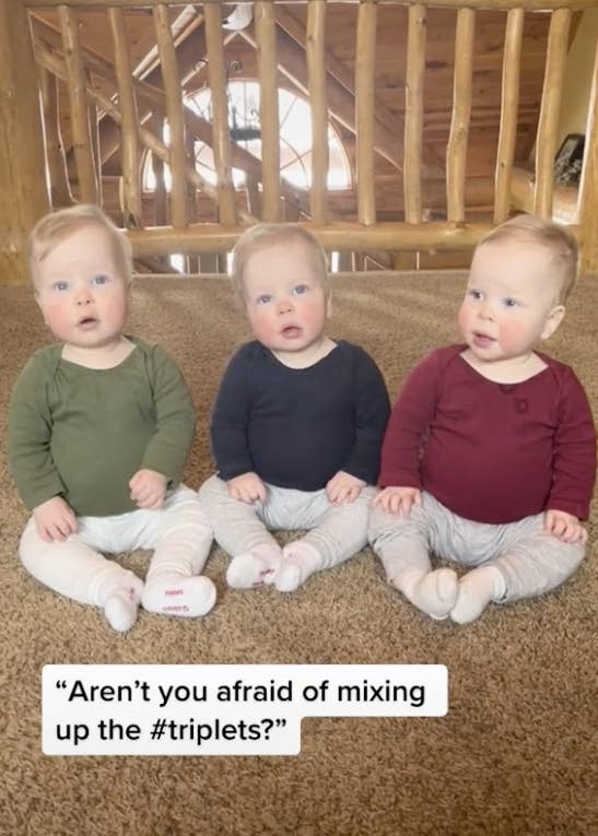 A photo of the triplets with a caption asking if she's afraid of mixing them up