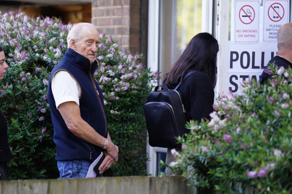 Actor Charles Dance waits in line to cast his vote at Willingham Close TRA Hall in London (James Manning/PA Wire)
