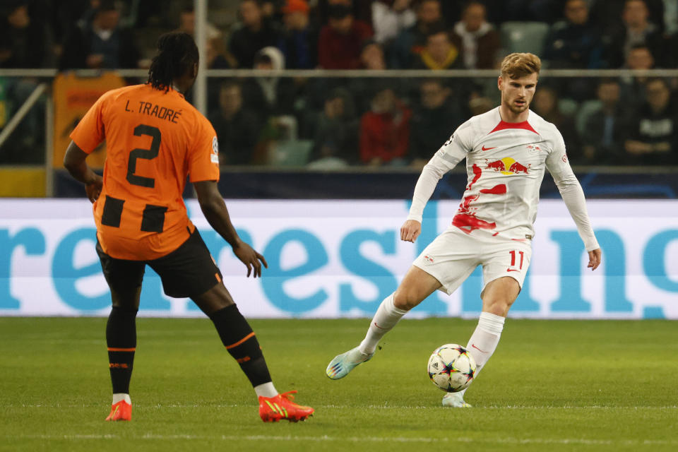 Leipzig's Timo Werner, right, controls the ball during the Champions League group F soccer match between Shakhtar Donetsk and Leipzig at Polish Army Stadium stadium in Warsaw, Wednesday, Nov. 2, 2022. (AP Photo/Michal Dyjuk)