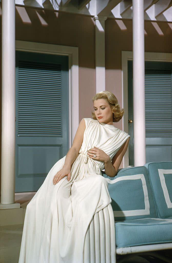 <p>Grace Kelly's diamond ring in <em>High Society </em>could be spotted from a mile away, but what makes the sparkler even more iconic is that it was the actress's real-life, Cartier 8-carat emerald cut diamond engagement ring. As the actress was already engaged during filming, <em>High Society</em> was Kelly's final film before her wedding to the Prince of Monaco. </p>