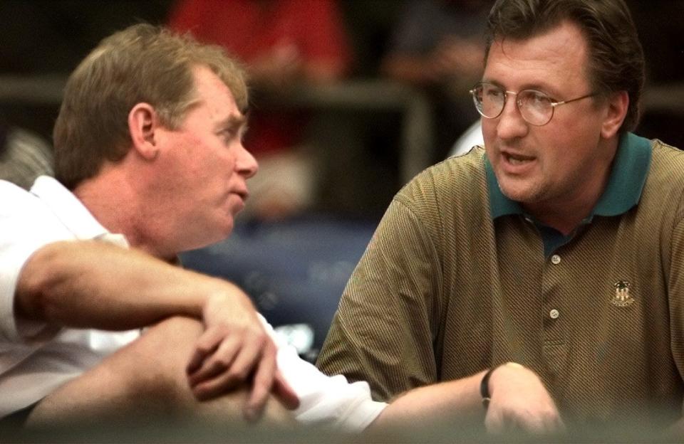 Skip Prosser and Bob Huggins attend a Reds vs. Indians game in 1999.