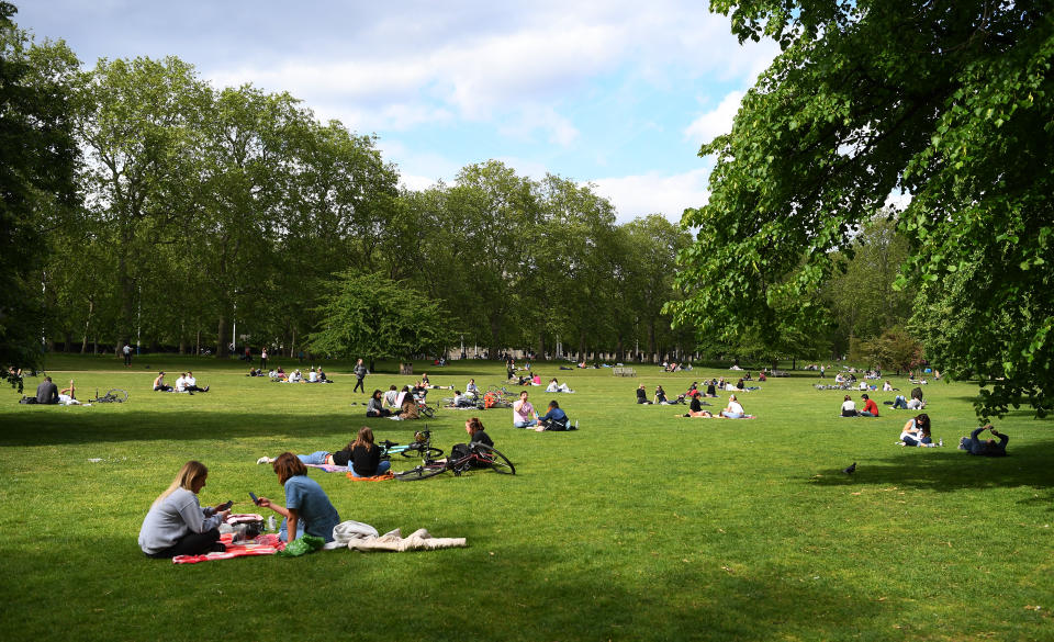 LONDON, ENGLAND- MAY 16: Members of the public relax in St James's Park on May 16, 2020 in London, England . The prime minister announced the general contours of a phased exit from the current lockdown, adopted nearly two months ago in an effort curb the spread of Covid-19. (Photo by Alex Davidson/Getty Images)