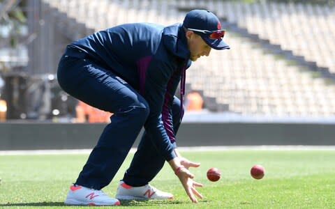 England captain Joe Root catches two balls during a nets session at Seddon Park  - Credit: Getty images