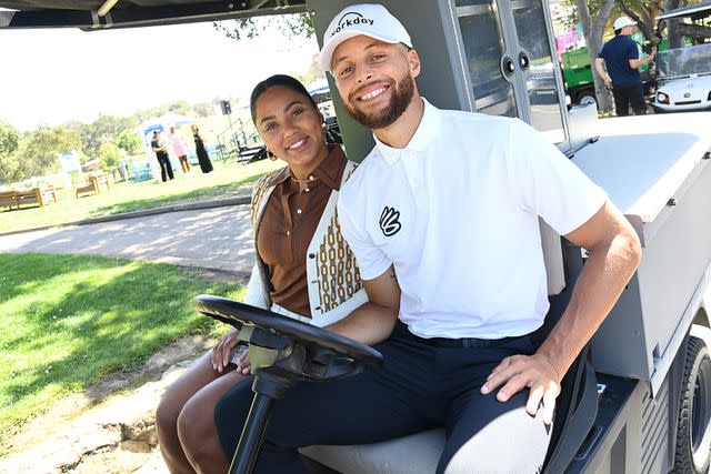 <p>Noah Graham/Getty Images </p> Ayesha Curry and Stephen Curry