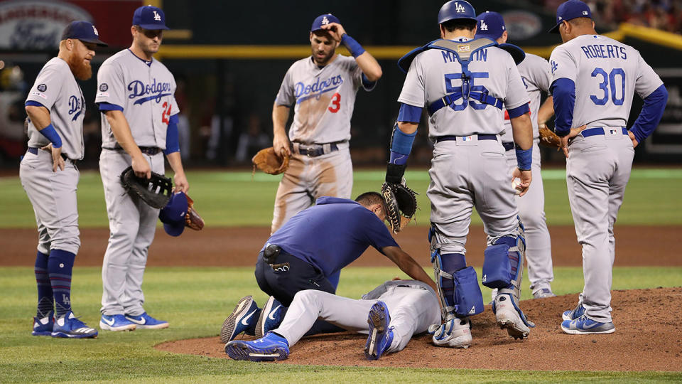 Dustin May, pictured here receiving treatment after he was hit.