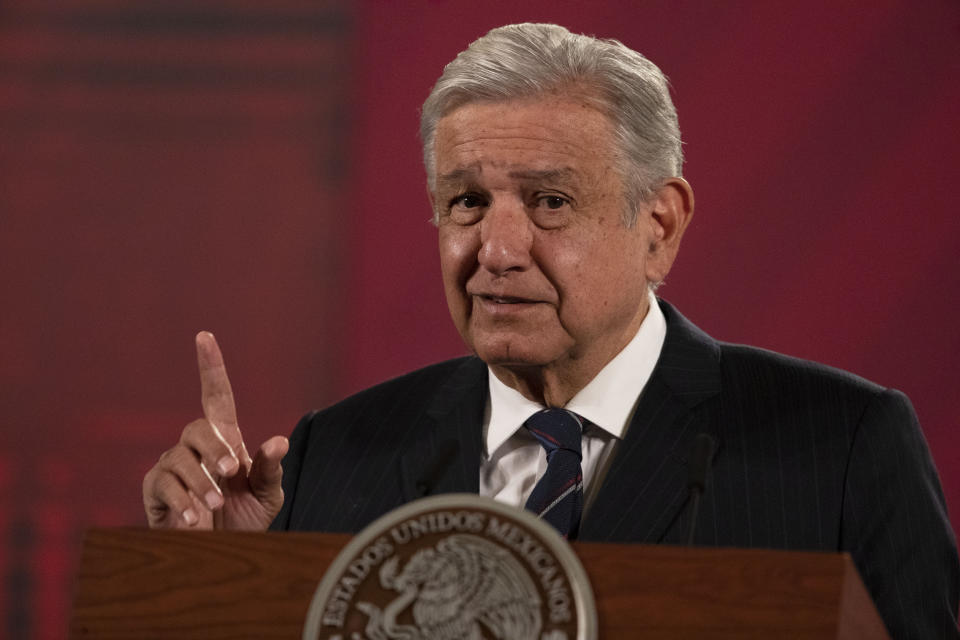 Mexican President Andres Manuel Lopez Obrador gives his daily, morning news conference at the presidential palace, Palacio Nacional, in Mexico City, Friday, Oct. 16, 2020. López Obrador said Friday that his ambassador to the United States told him two weeks ago that there was an investigation underway there involving Mexico's former defense secretary, retired Gen. Salvador Cienfuegos, who was arrested Thursday in Los Angeles. (AP Photo/Marco Ugarte)