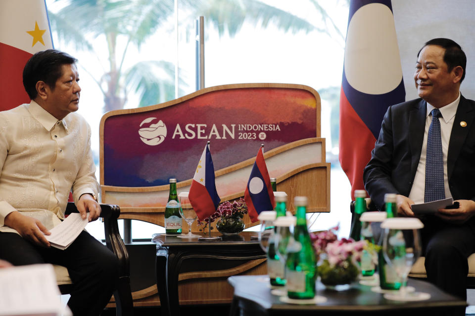 Philippine President Ferdinand Marcos Jr., left, talks with Laotian Prime Minister Sonexay Siphandone during their bilateral meeting on the sidelines of the 42nd ASEAN Summit in Labuan Bajo, East Nusa Tenggara province, Indonesia, Wednesday, May 10, 2023. (Willy Kurniawan/Pool Photo via AP)