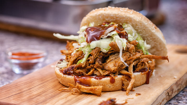 Pulled pork sandwich on board